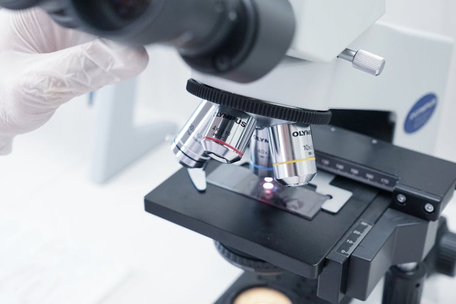 Detailed view of a microscope in a laboratory used in scientific research.